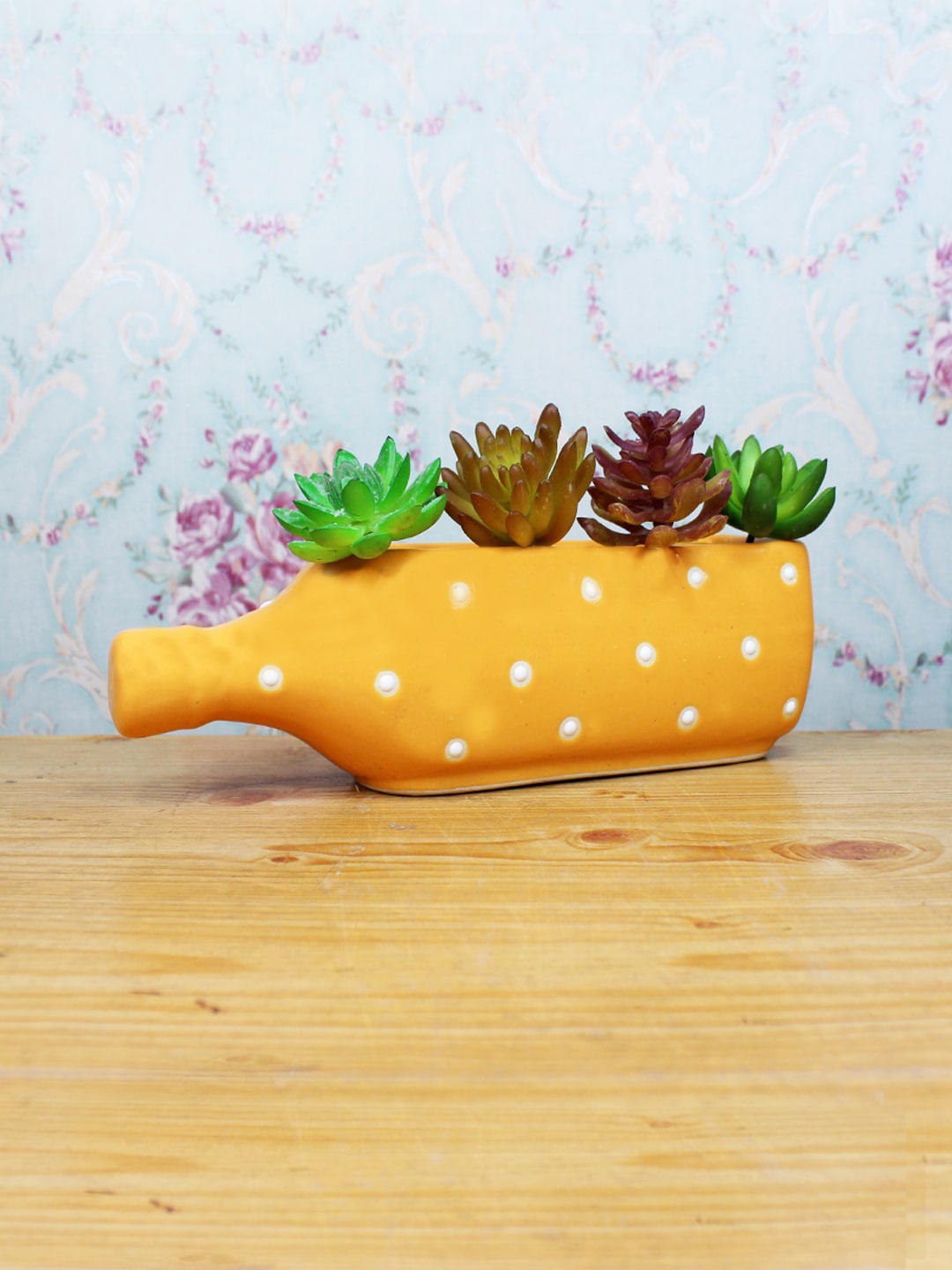 

Wonderland Yellow Ceramic Polka Dot Printed Bottle-Shaped Planter