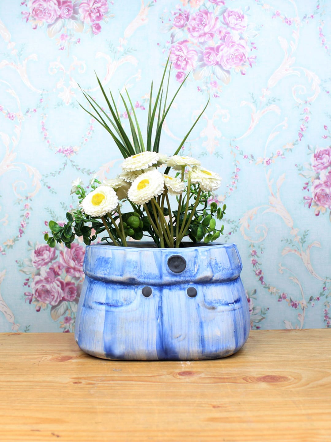 

Wonderland Blue Ceramic Jeans Planter
