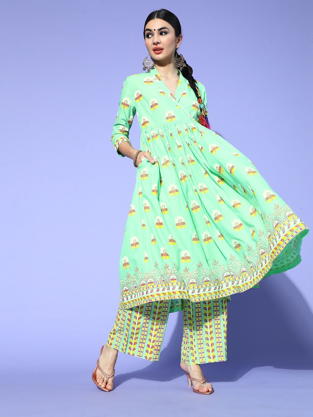 

Sangria Geometric Pure Cotton Swirling Volume Kurta Set, Green