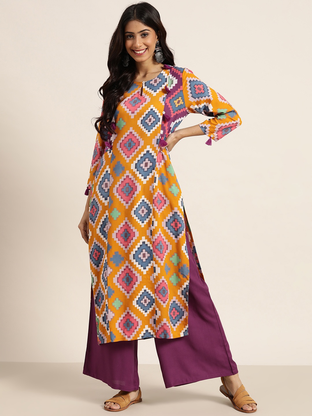 

Sangria Women Mustard Yellow & Purple Printed Kurta with Palazzos
