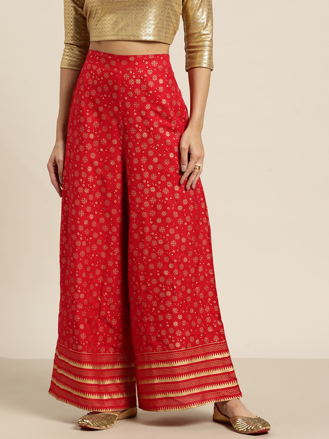 

Sangria Women Red & Golden Ethnic Motifs Printed Flared Palazzos