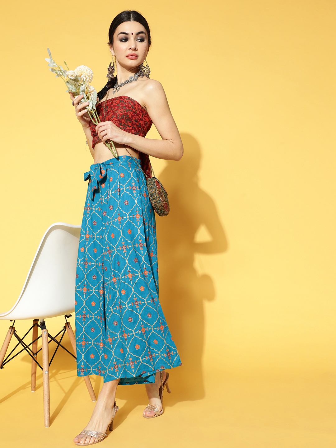 

Sangria Women Blue & Golden Ethnic Motifs Printed Cropped Palazzos