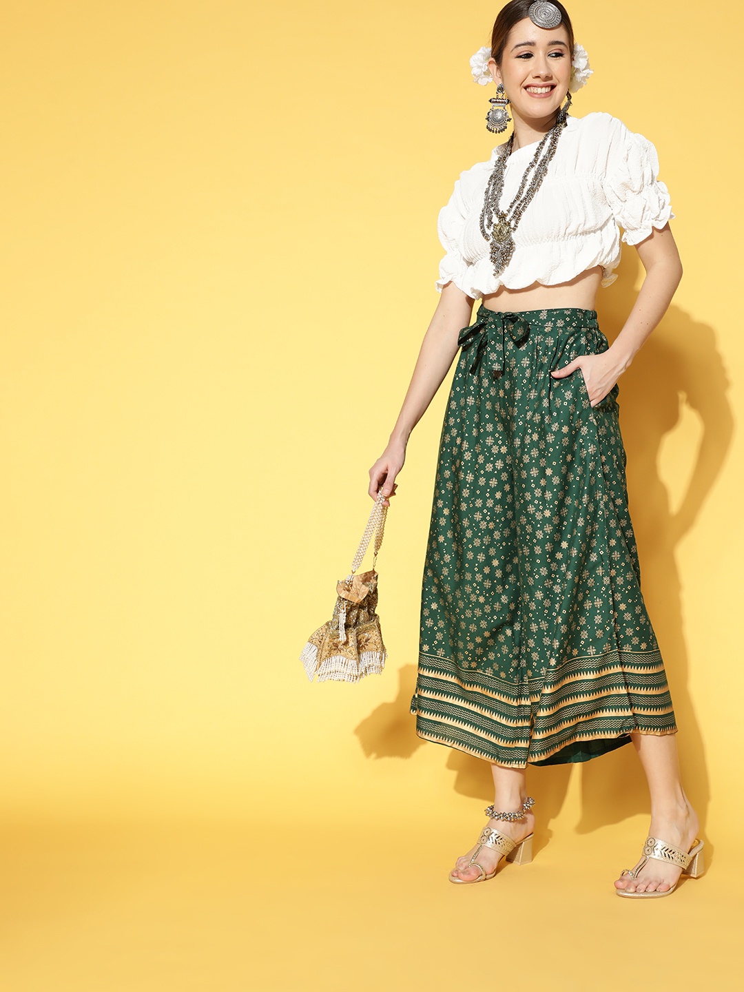 

Sangria Women Green & Golden Ethnic Motifs Printed Cropped Palazzos