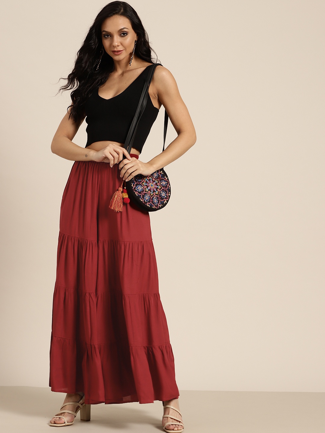 

Sangria Women Maroon Solid Tiered Flared Palazzos