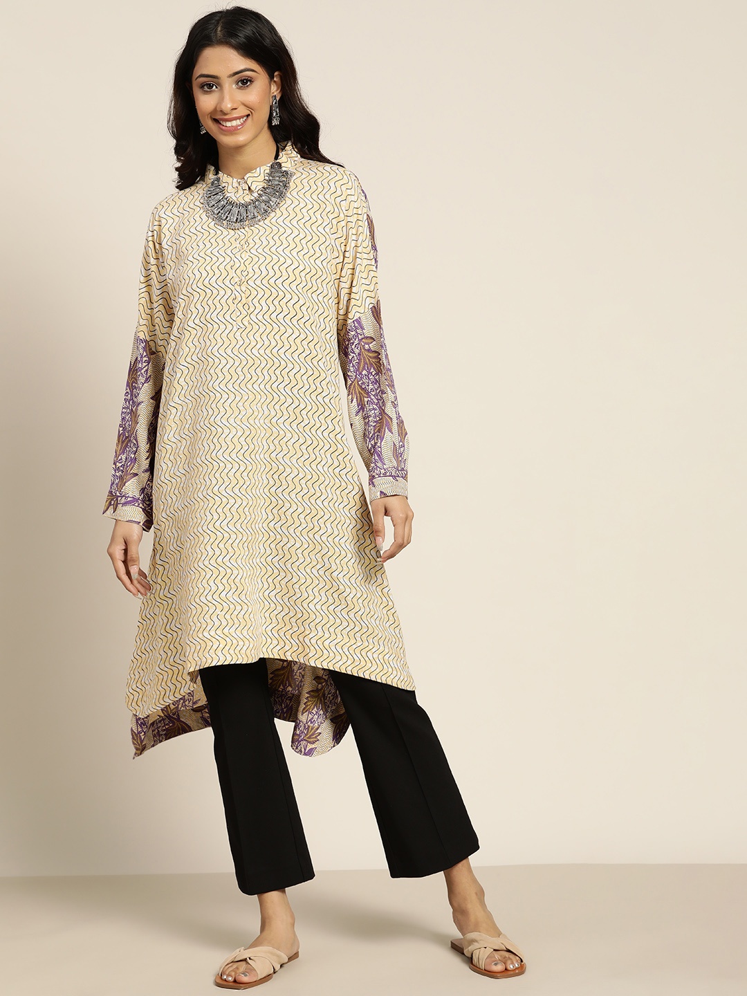

Sangria Women Beige & Purple Floral Printed Tunic with Asymmetric Hem