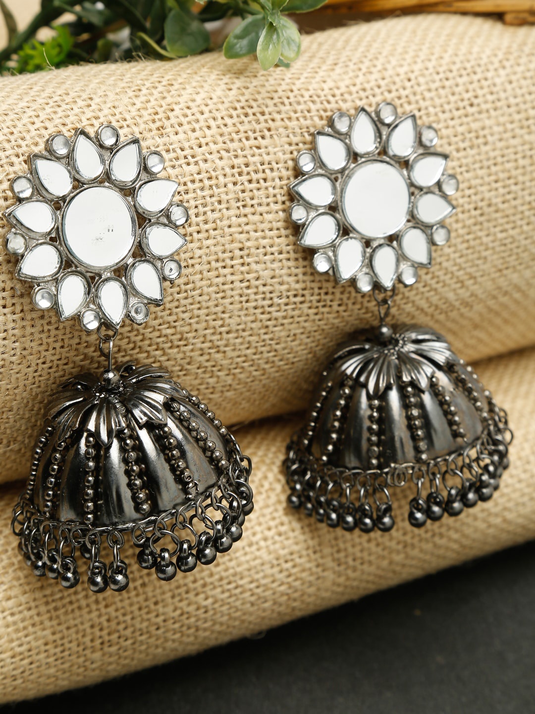 

NEUDIS Women Silver-Toned Kundan Dome Shaped Jhumkas Earrings