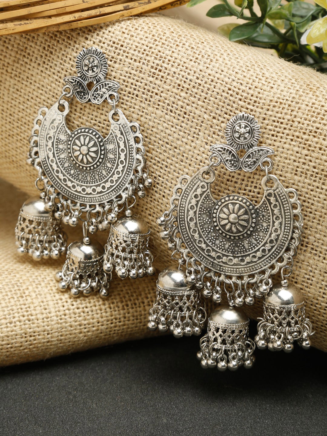 

NEUDIS Silver-Toned Contemporary Jhumkas Earrings