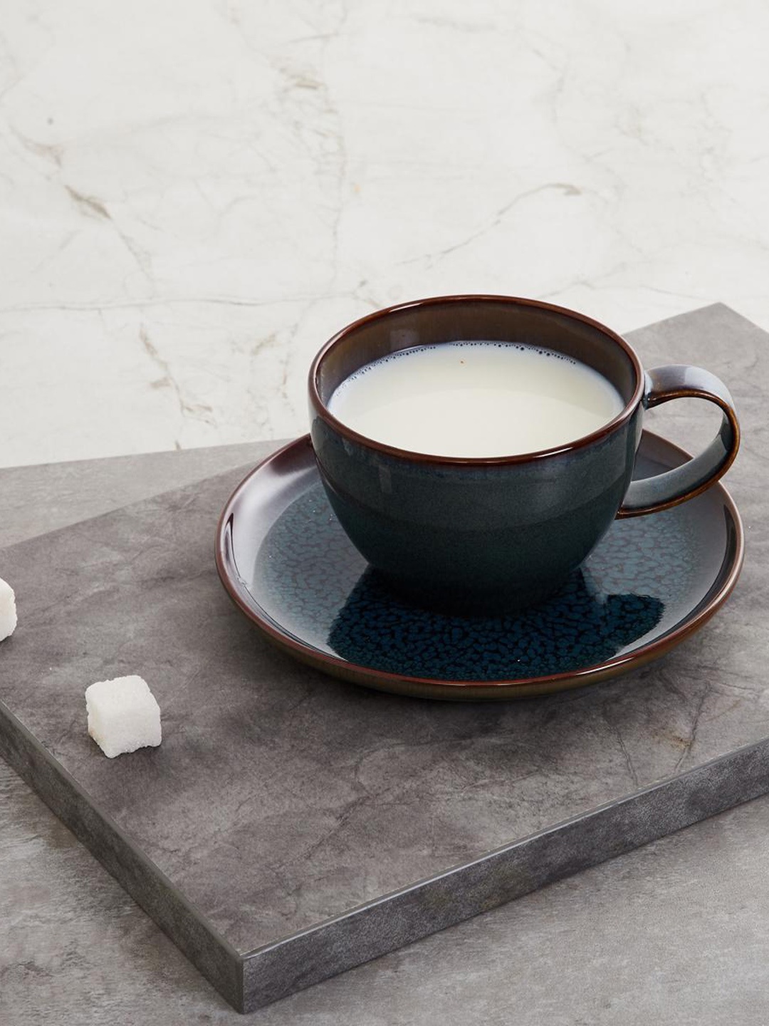 

Home Centre Blue Fiesta Denim Printed Porcelain Cup and Saucer Set