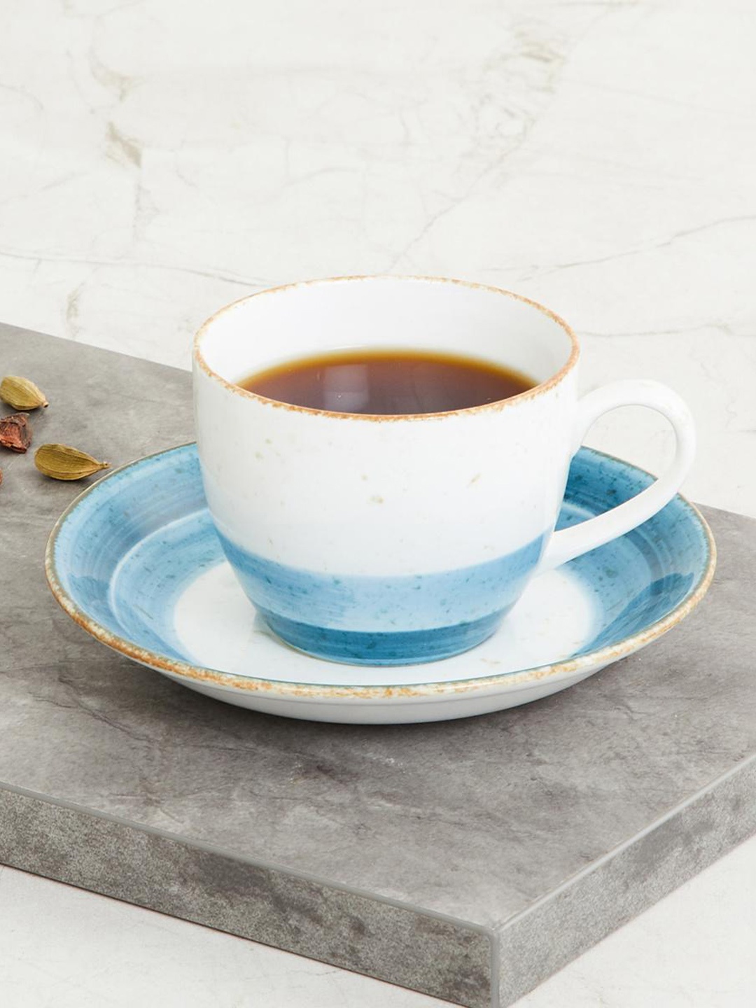 Home Centre Blue & White Fiesta Printed Cup and Saucer Set