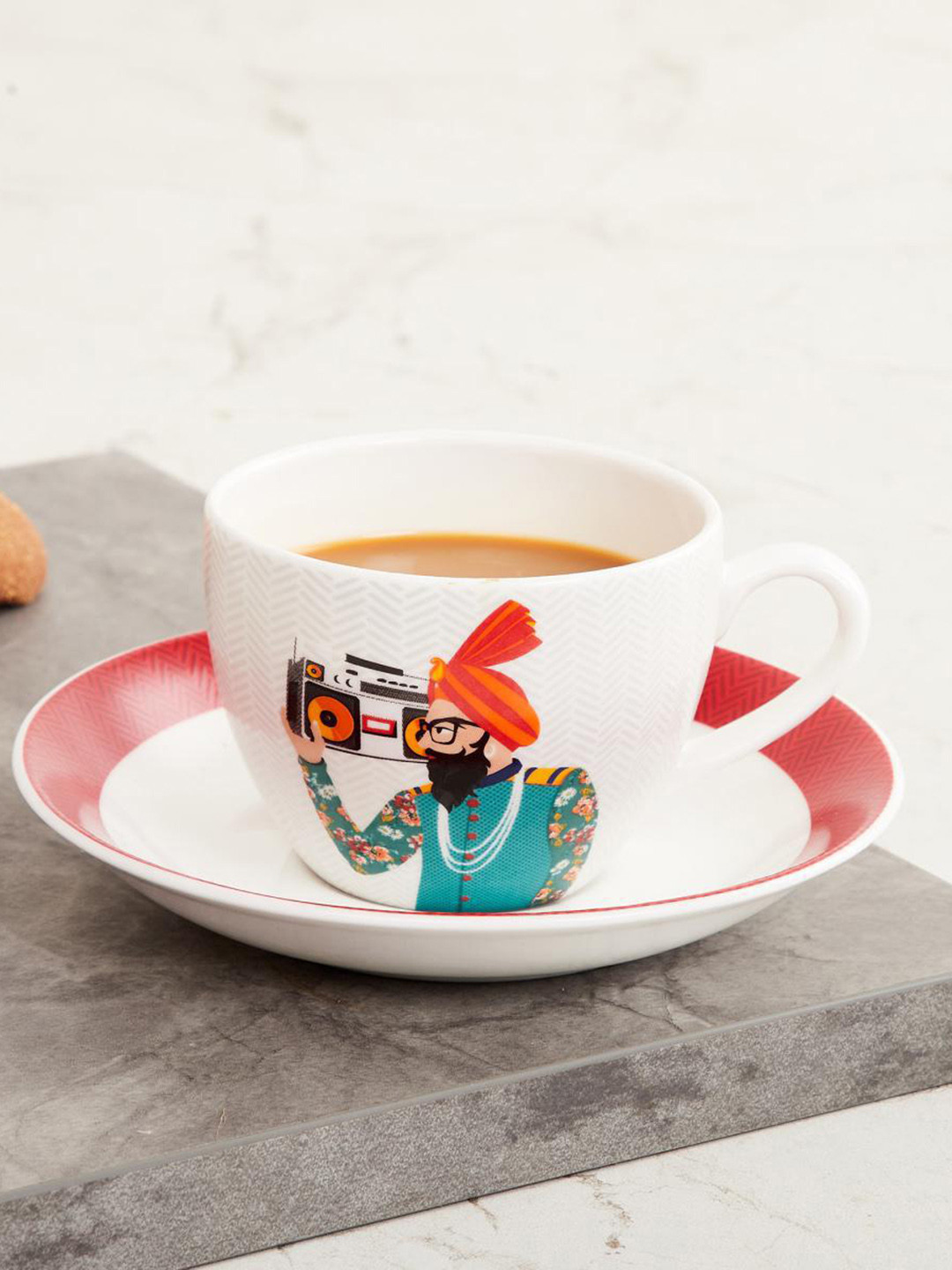 

Home Centre White & Red Raisa Pop Street Printed Cup and Saucer Set