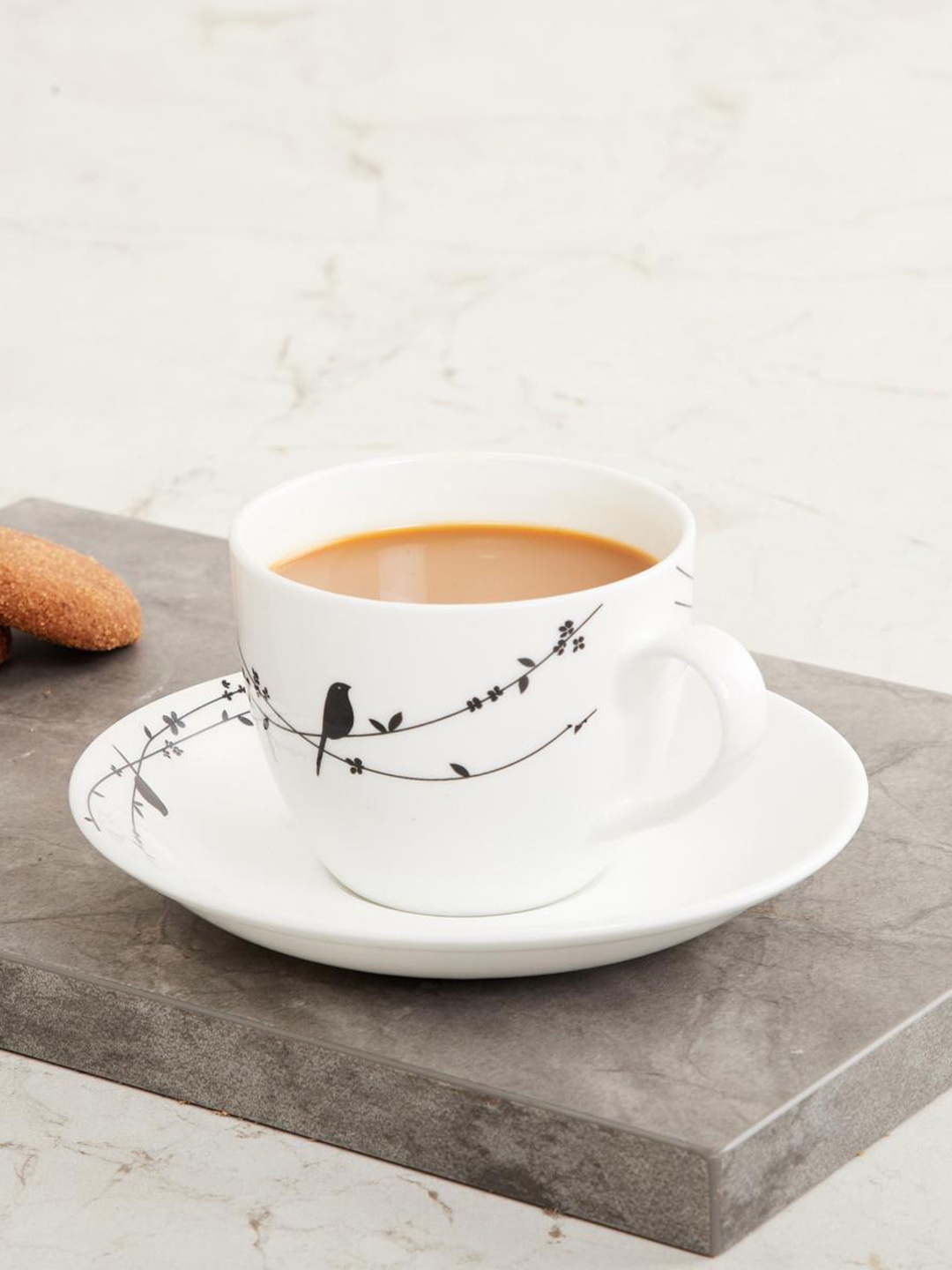 

Home Centre White Printed Allure Hipo Cup and Saucer