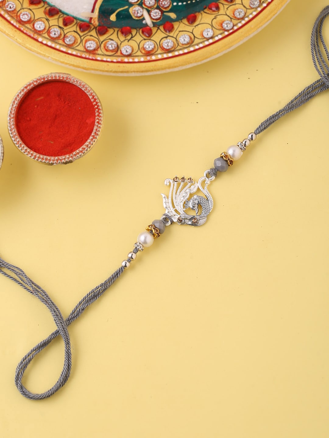 

Voylla Peacock Passion Rakhi with Roli Chaawal Pack, Silver