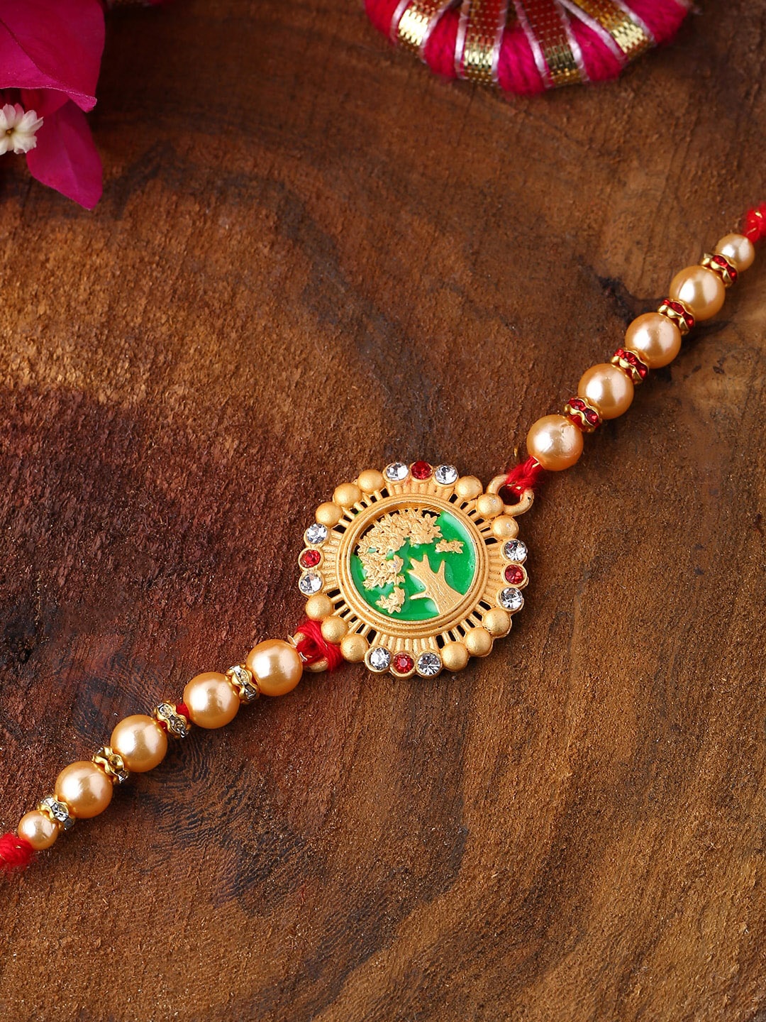 

Voylla Beige Beaded Enamel Rakhi with Roli Chaawal Pack, Red