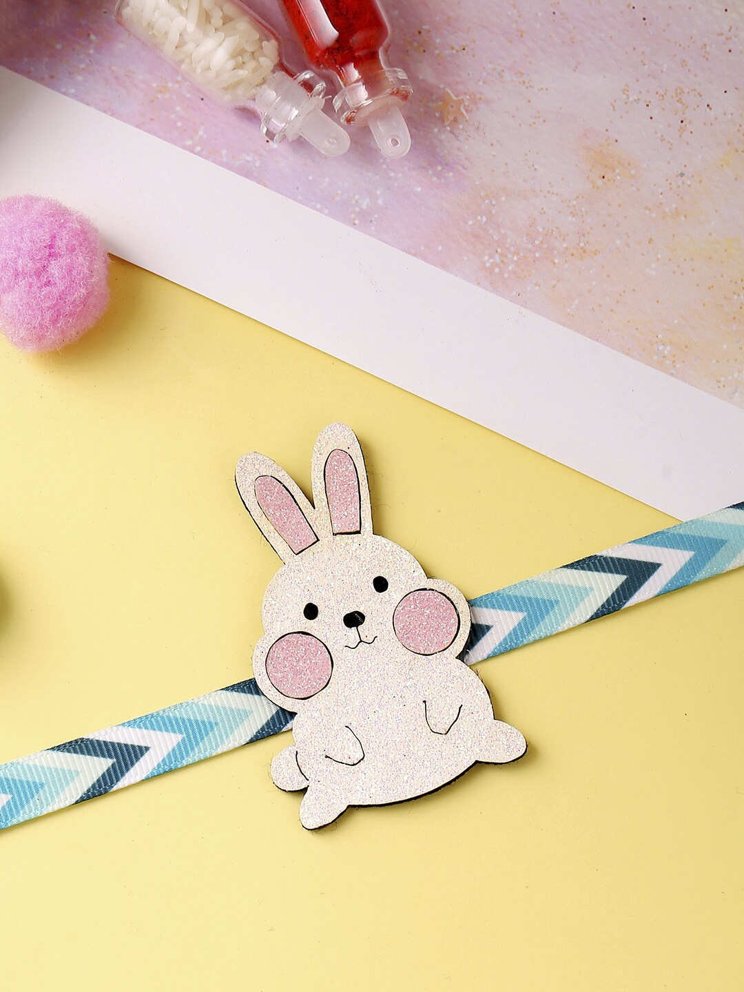 

Voylla Kids Blue & White Cute Bunny Rakhi With Roli Chaawal Pack