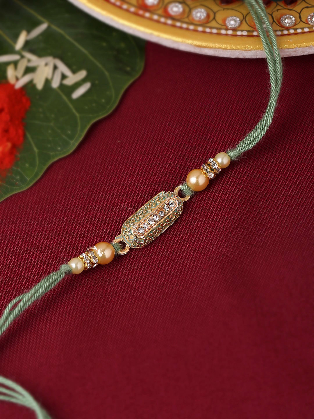 

Voylla Green & Beige Exquisite Beaded Rakhi With Roli Chaawal Pack