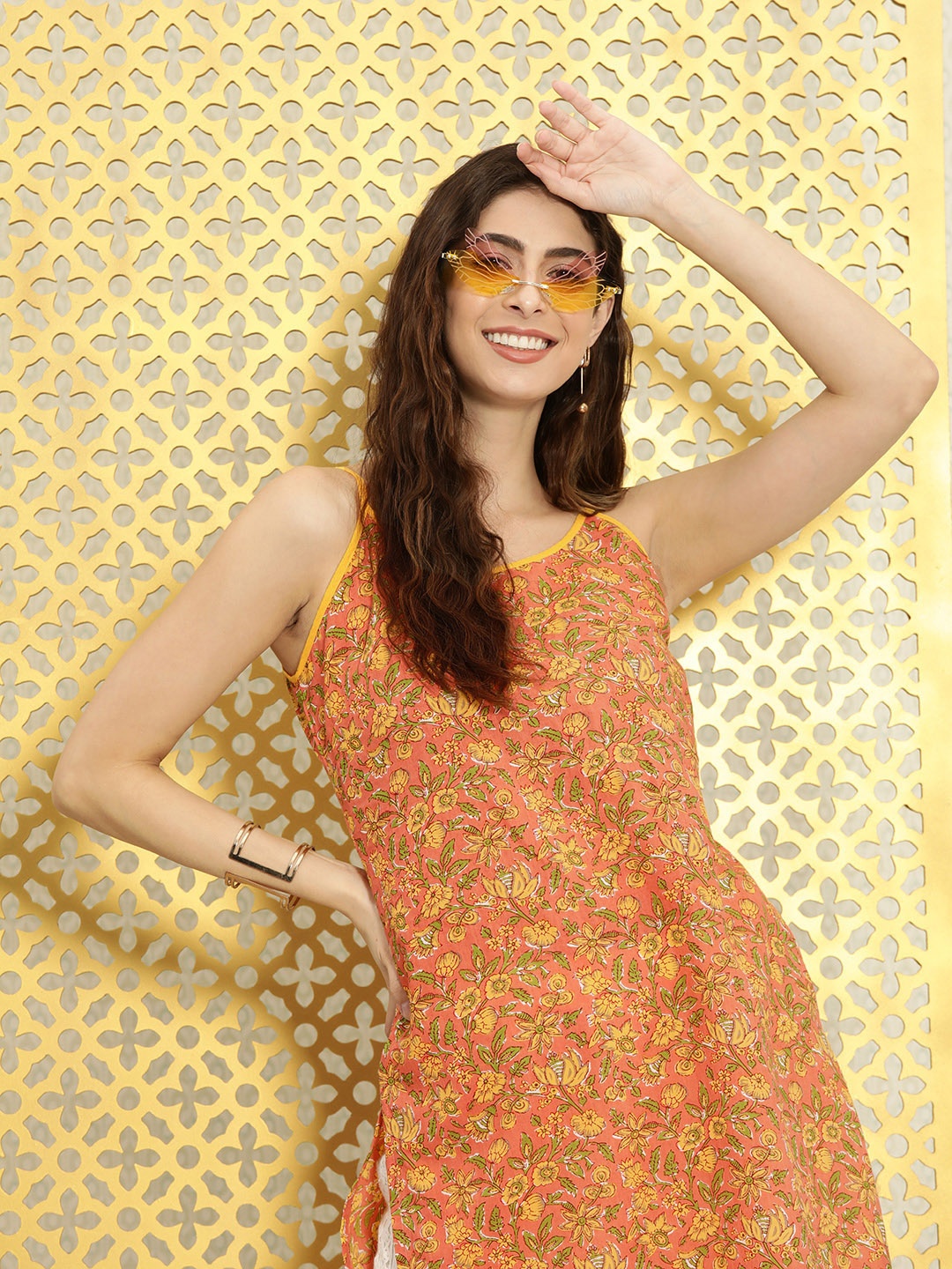 

Ode by House of Pataudi Women Peach-Coloured & Yellow Printed Cotton Straight Kurta