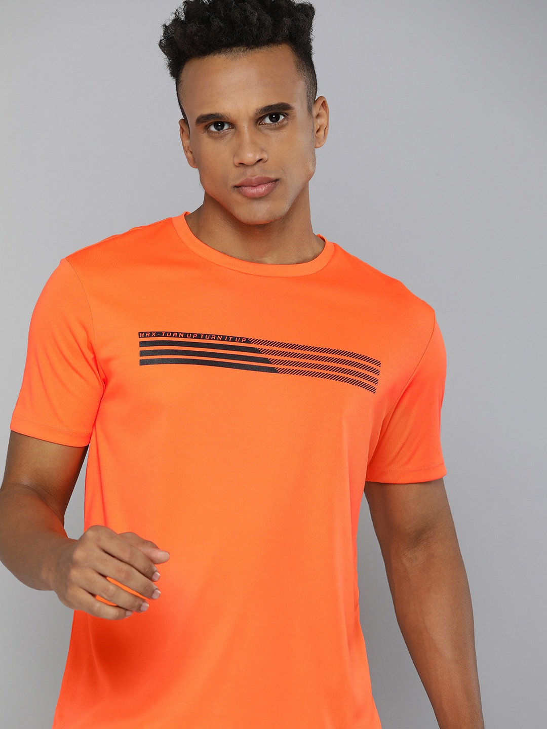 

HRX By Hrithik Roshan Training Men Neon Orange Rapid-Dry Typography Printed T-shirt