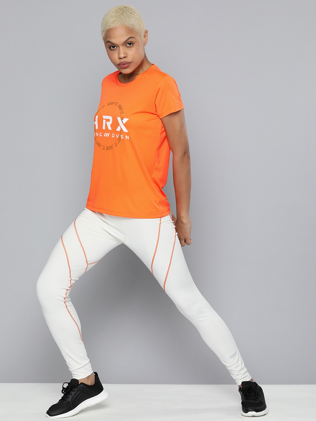 

HRX By Hrithik Roshan Training Women Neon Orange Rapid-Dry Brand Carrier Tshirts