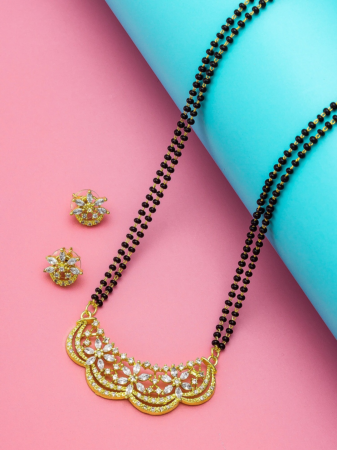 

aadita Gold-Plated White & Black AD-Studded & Beaded Mangalsutra With Earrings