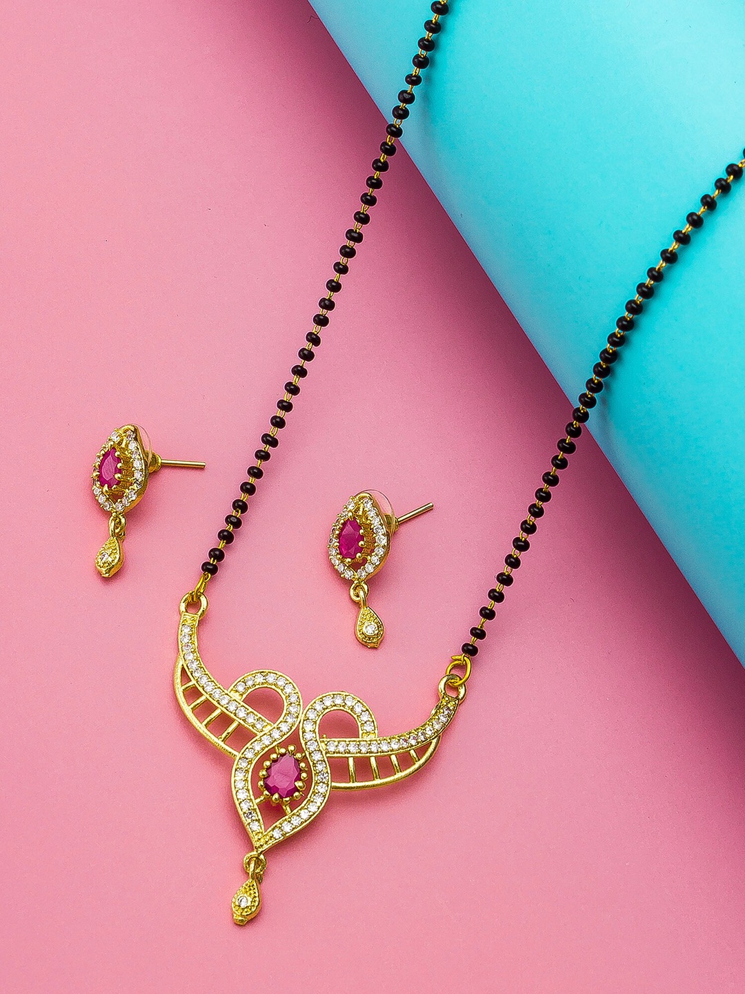 

aadita Gold-Plated Black & White AD-Studded & Beaded Mangalsutra With Earrings
