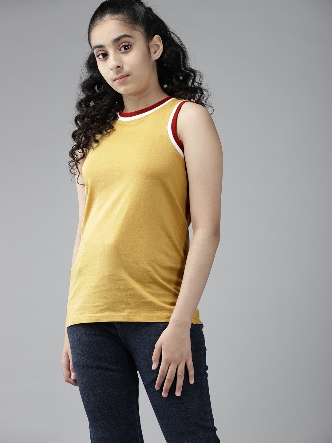 

UTH by Roadster Girls Yellow Pure Cotton Solid Sleeveless T-shirt