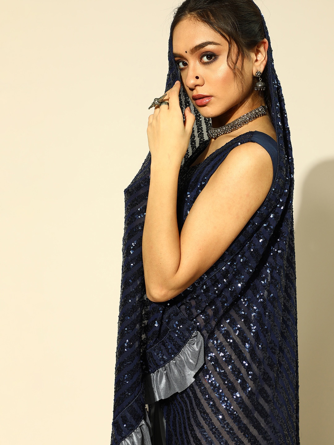 

Chhabra 555 Blue & Grey Striped Sequinned Saree