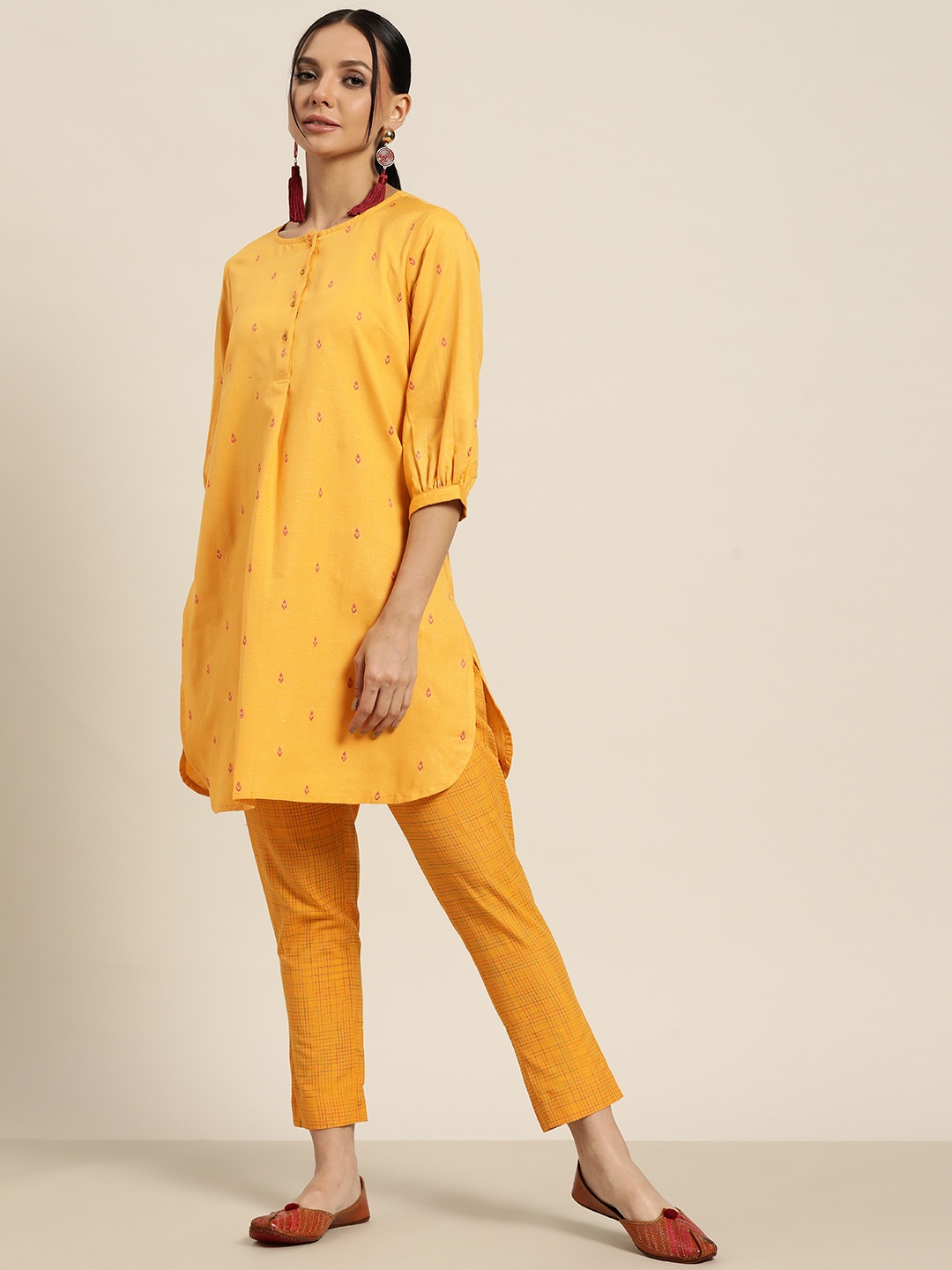 

Sangria Women Yellow Ethnic Motifs Woven Design Regular Kurta with Trousers