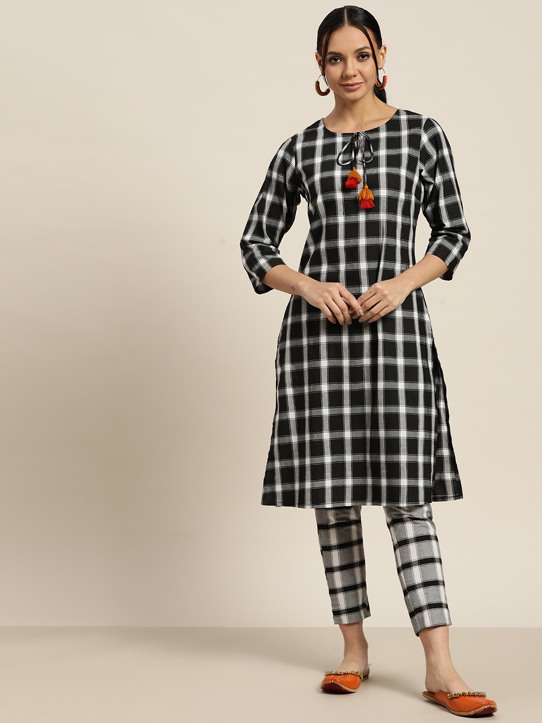 

Sangria Women Black & White Checked Regular Kurta with Trousers