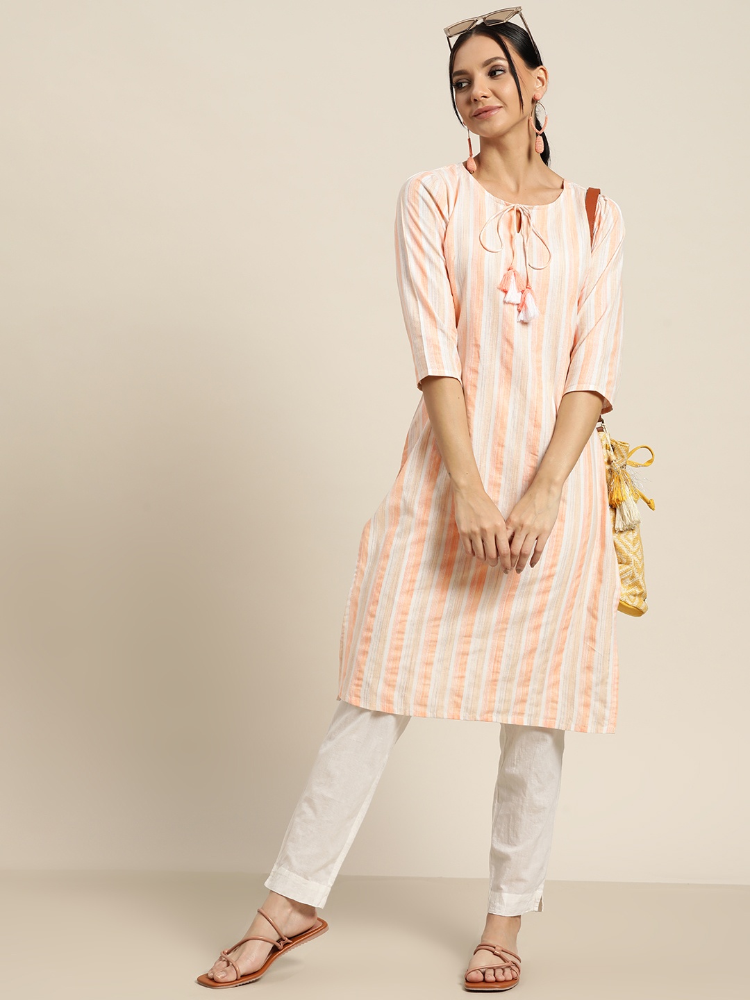 

Sangria Women Peach-Coloured & Off White Tie-Up Neck Striped Straight Kurta