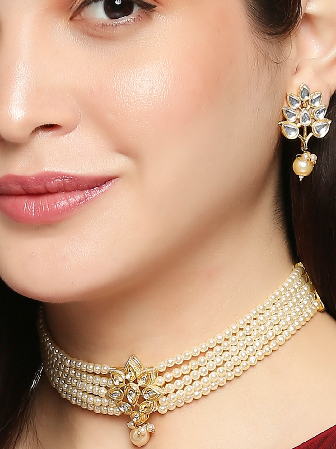 

OOMPH Gold-Toned & Off White Kundan-Studded & Pearl Beaded Handcrafted Jewellery Set