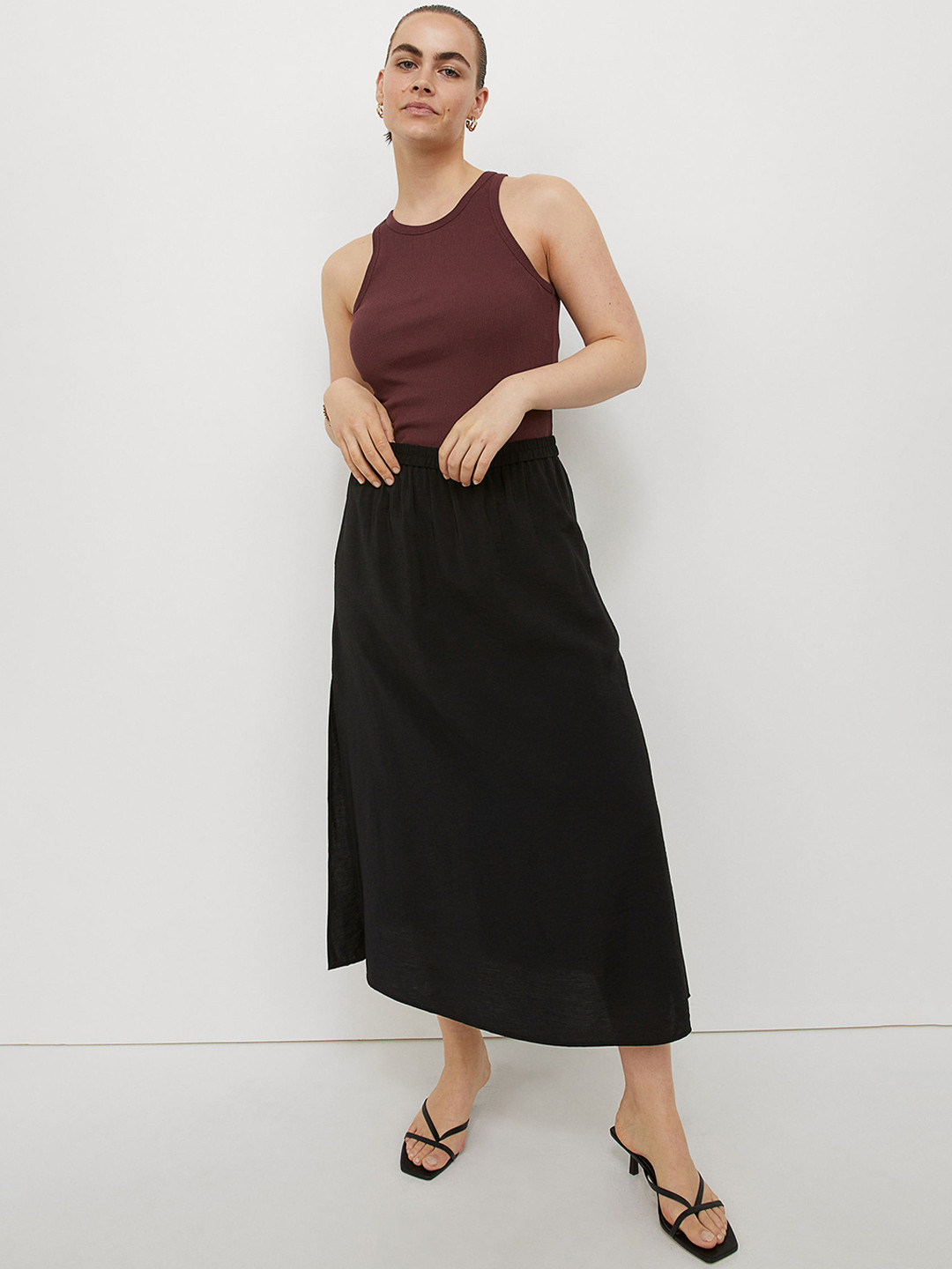 

H&M Women Black Solid Long Skirt