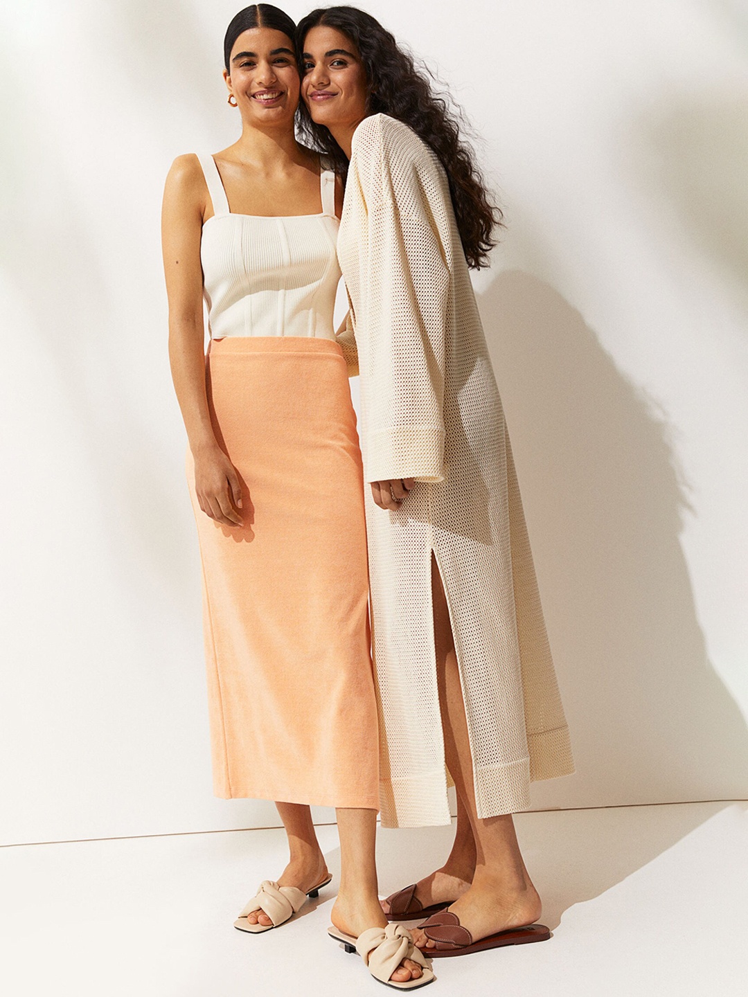 

H&M Women Orange Coloured Maxi Skirt