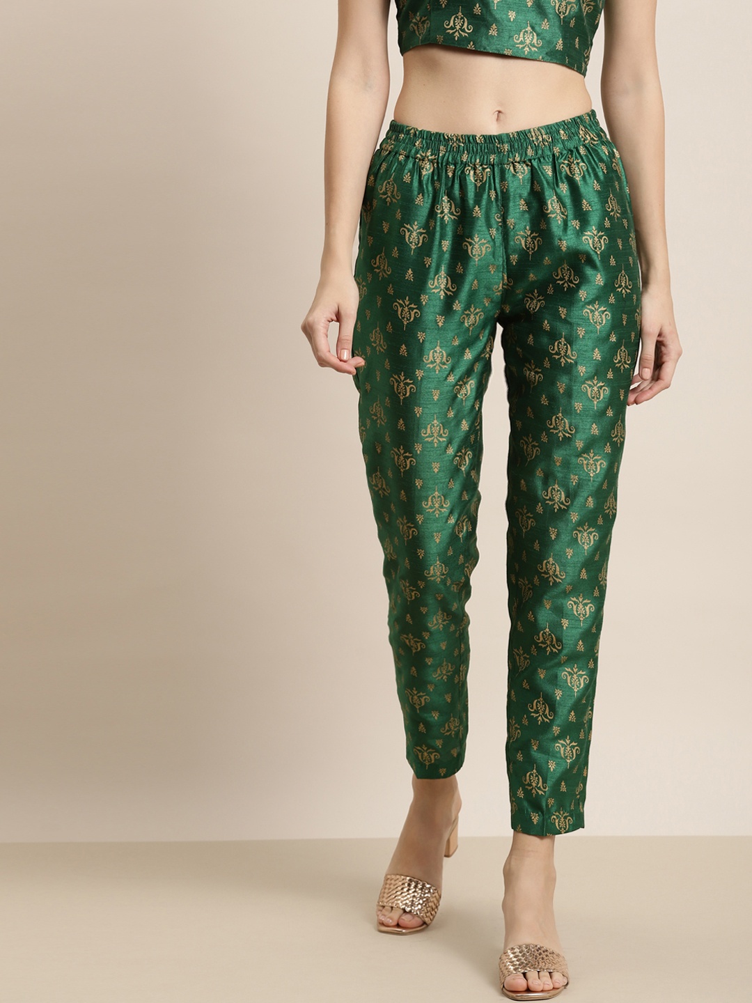 

Shae by SASSAFRAS Women Green Ethnic Motifs Printed Tapered Fit Cigerette Trousers