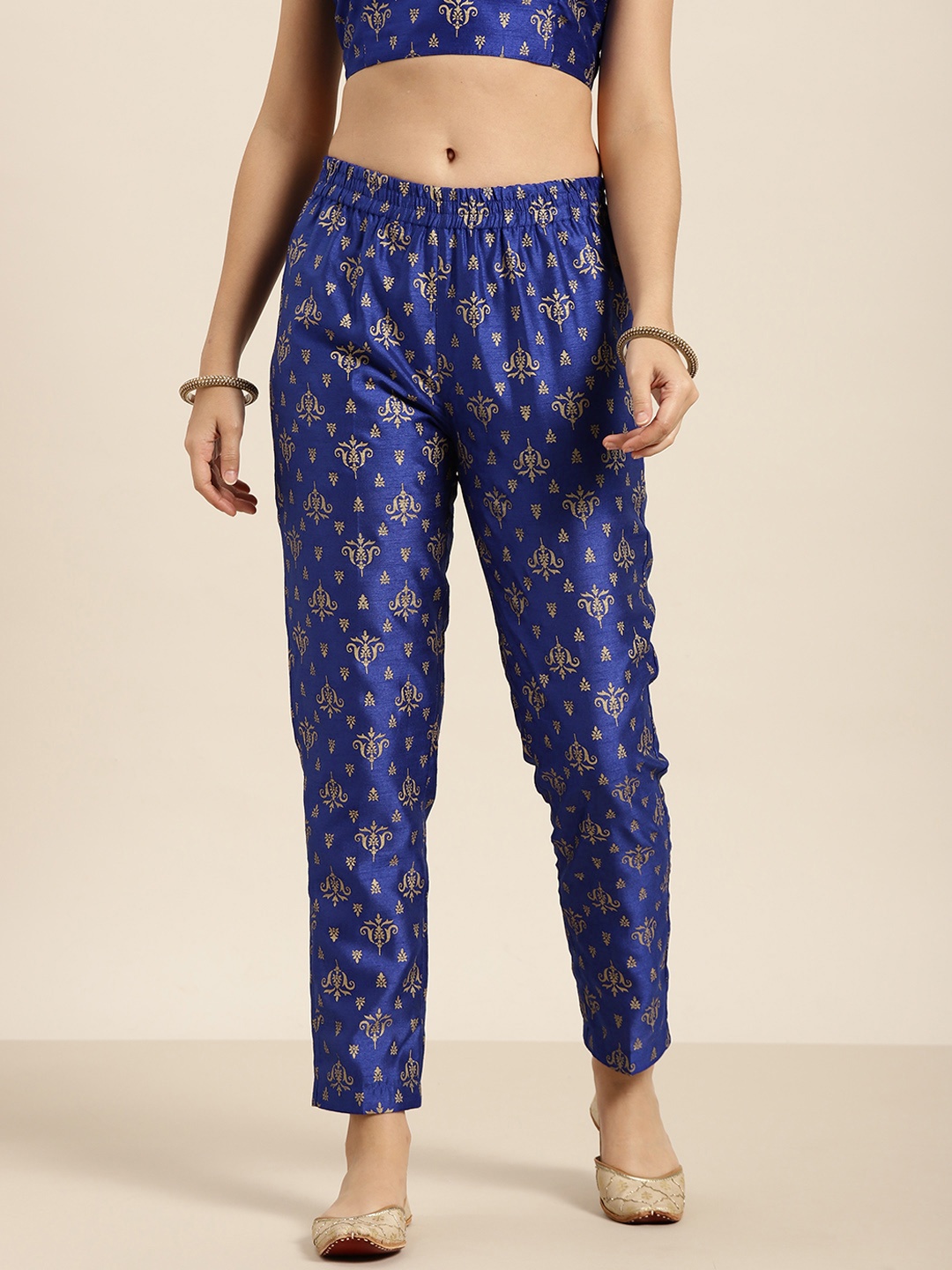

Shae by SASSAFRAS Women Blue Ethnic Motifs Printed Tapered Fit Trousers
