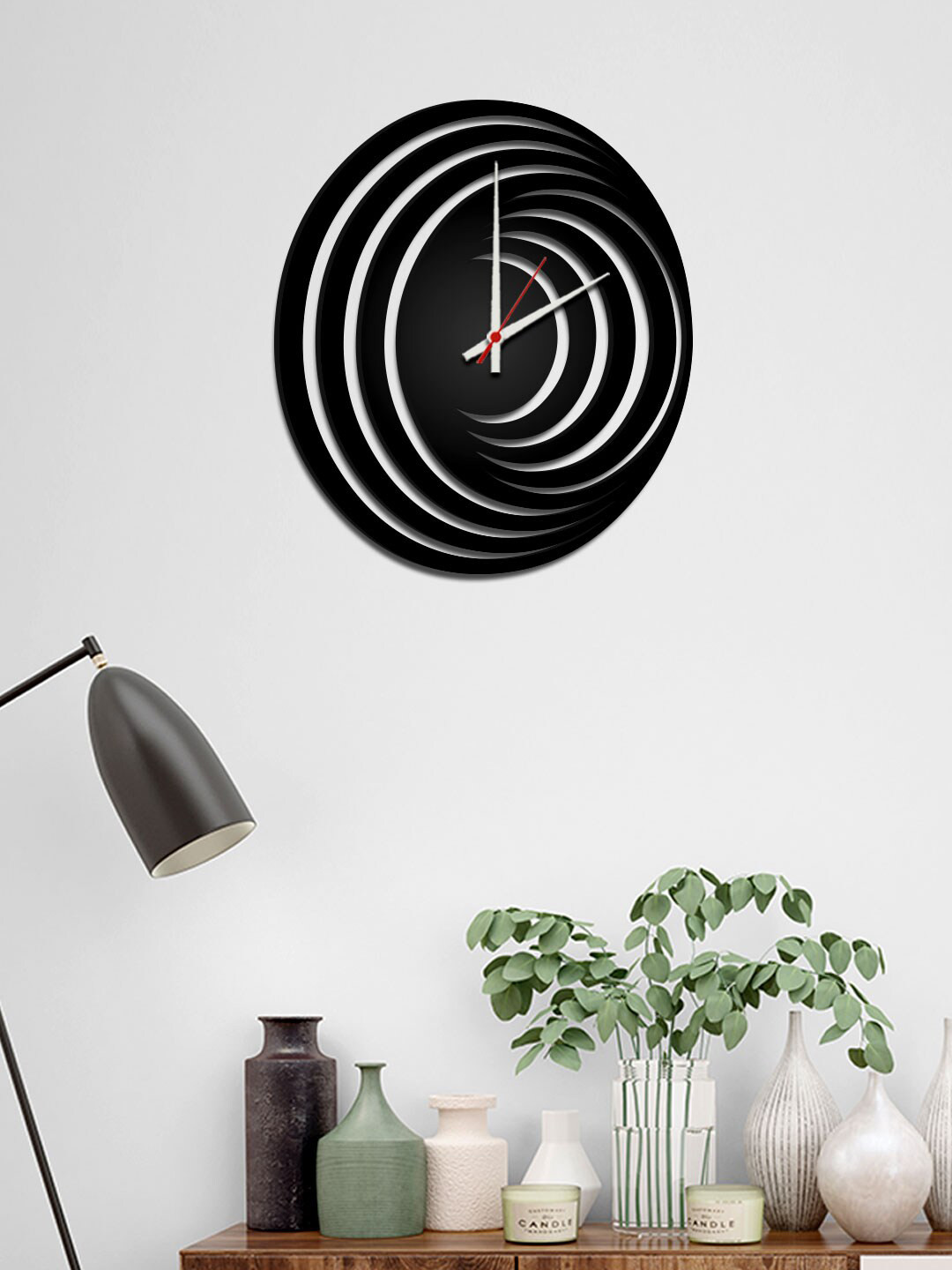 

WALLMANTRA Black & White Abstract Hurricane Logo Contemporary Wall Clock