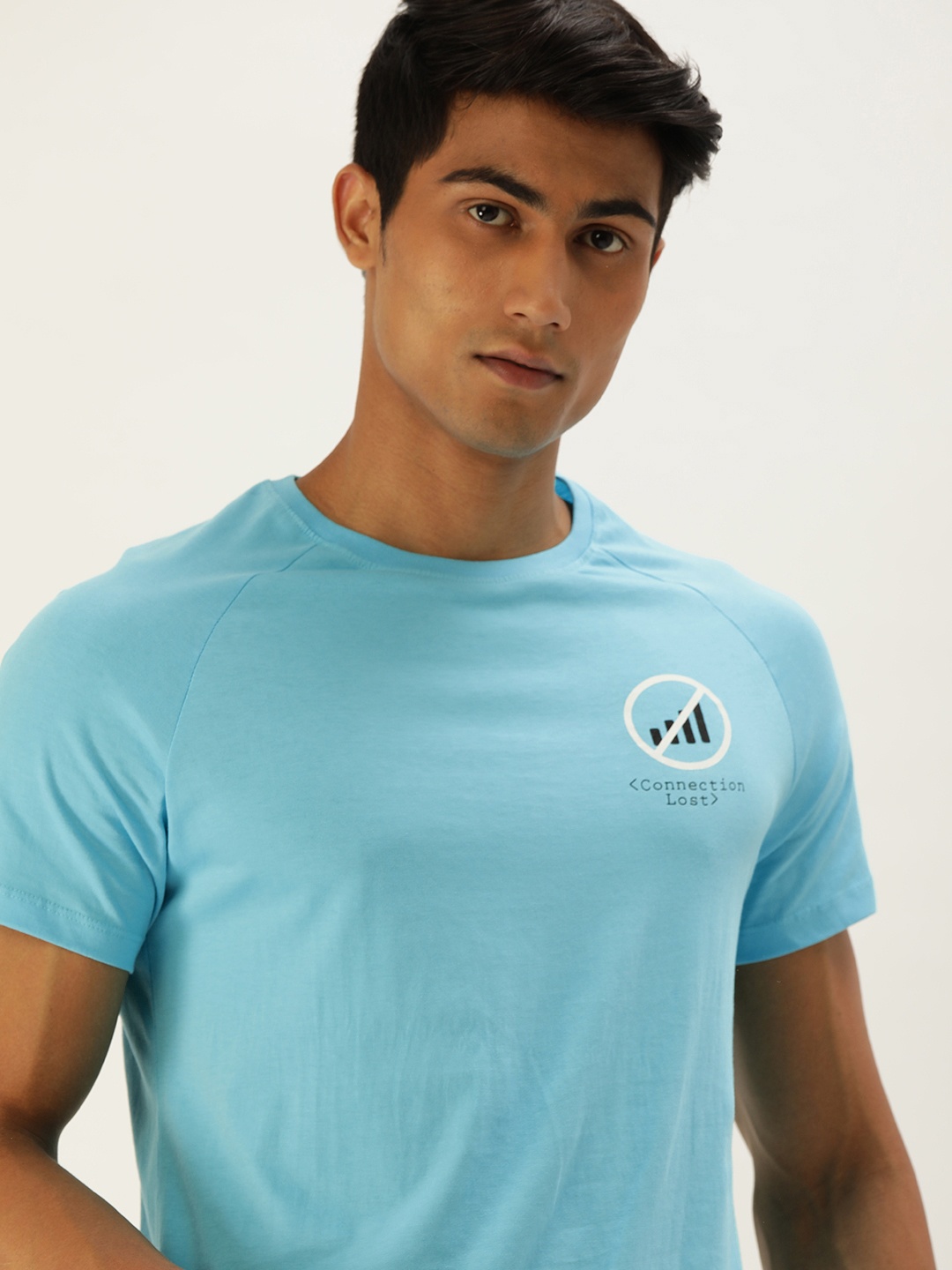 

SINGLE Men Blue Solid Slim Fit Round Neck T-shirt