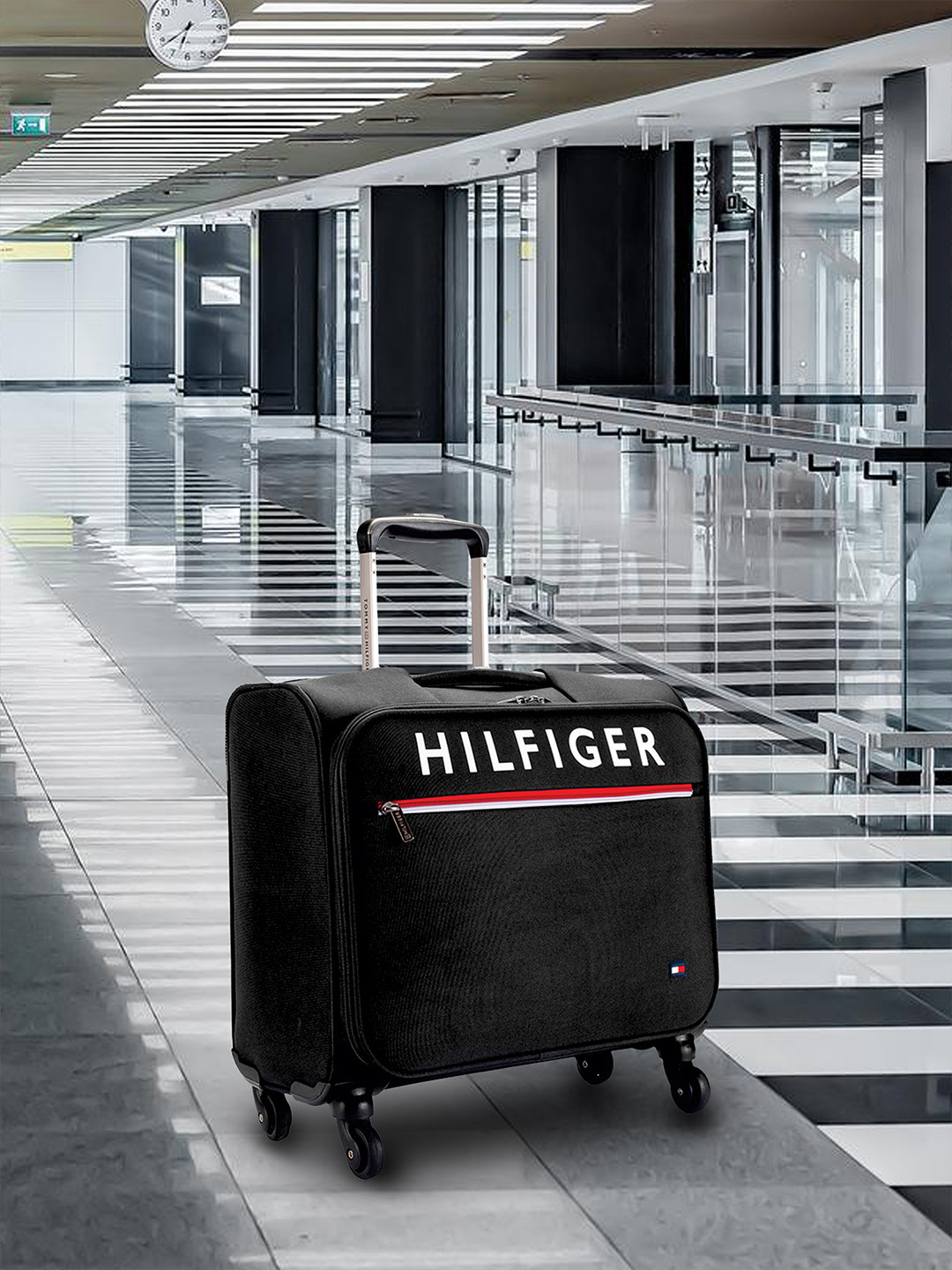 

Tommy Hilfiger Brand Logo Soft Sided Overnighter Overnighter Trolley- 45 Litres, Black
