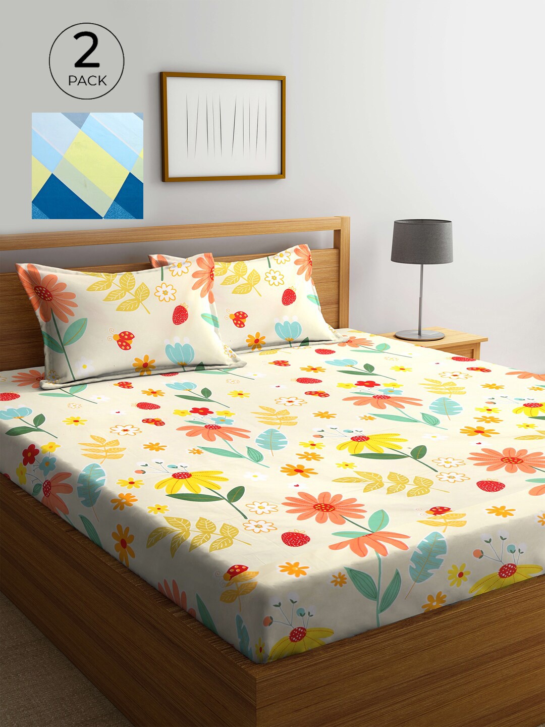 

Yellow & Blue Printed 300 TC 2 King Bedsheet with 4 Pillow Covers