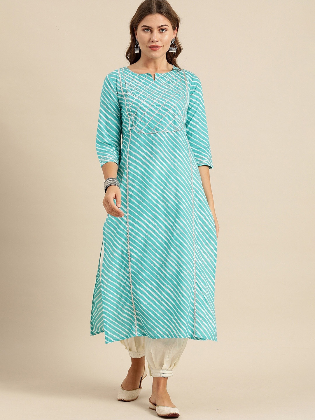 

Varanga Women Turquoise Blue & White Leheriya Printed Gotta Patti Straight Kurta