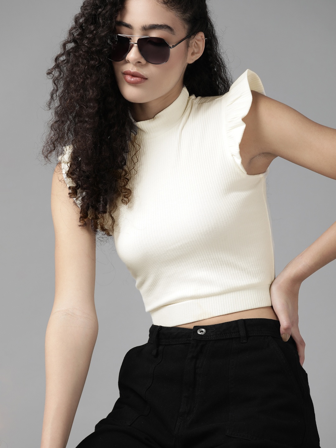 

Roadster Off White Solid Ribbed Top