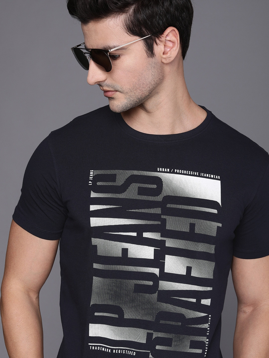 

Louis Philippe Jeans Men Navy Blue Brand Logo Printed T-shirt