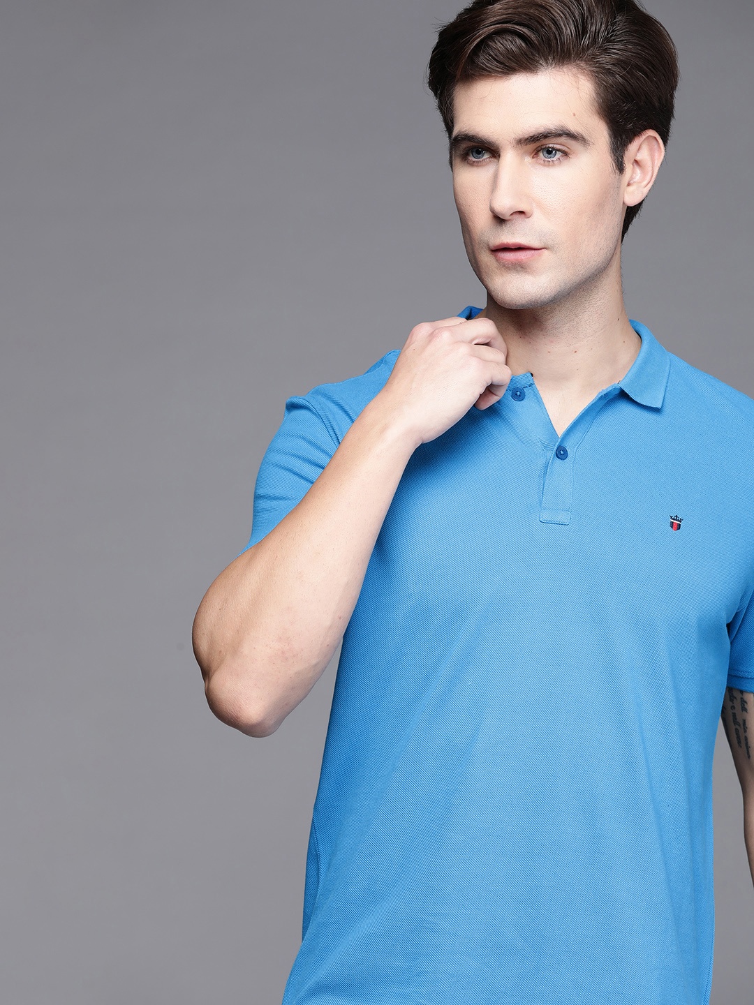 

Louis Philippe Sport Men Blue Pure Cotton Solid Polo Collar T-shirt