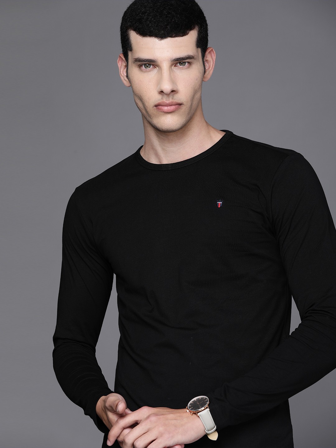 

Louis Philippe Jeans Men Black Solid Pure Cotton T-shirt