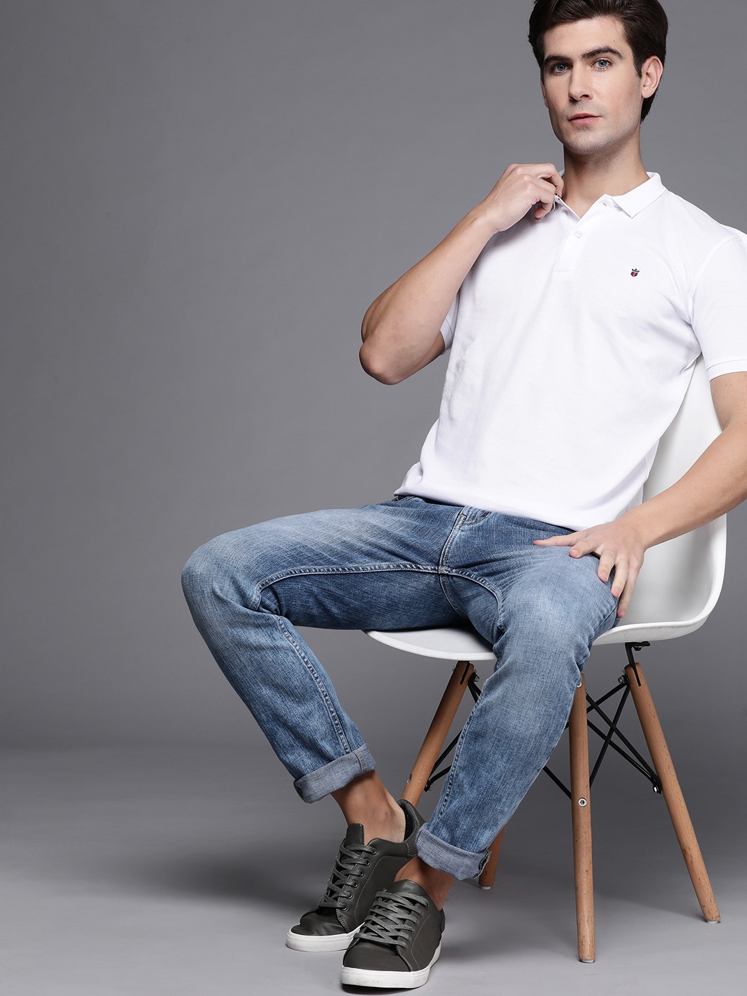 

Louis Philippe Sport Men White Pure Cotton Solid Polo Collar T-shirt