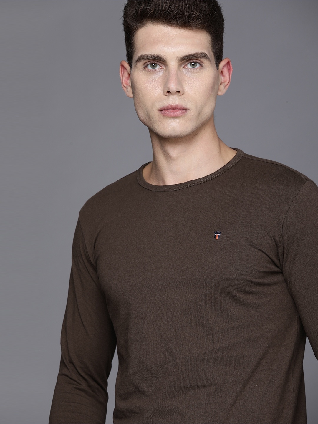 

Louis Philippe Jeans Men Brown Solid Pure Cotton T-shirt