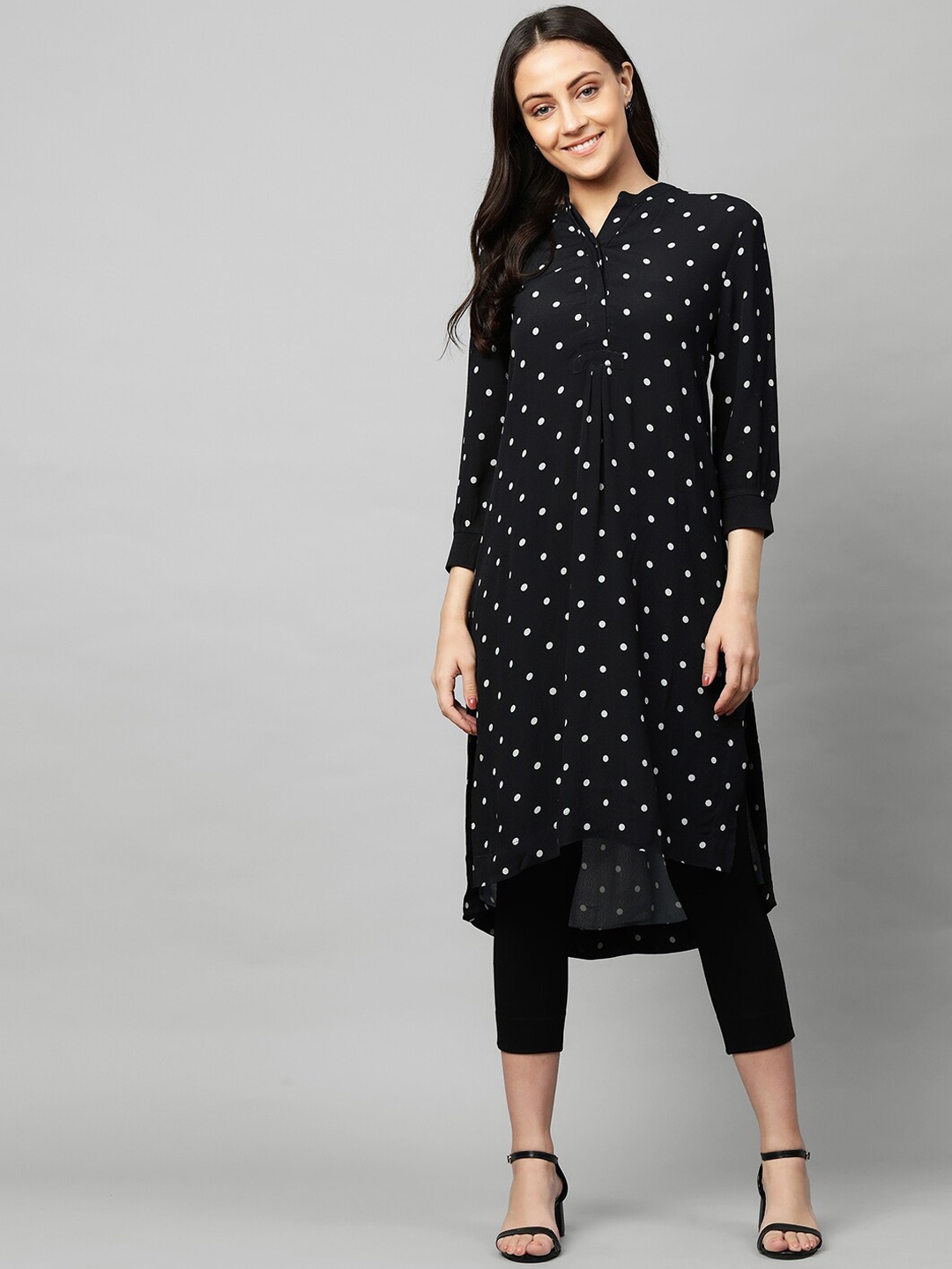 

Modern Indian by CHEMISTRY Women Black Printed Regular Kurta with Trousers