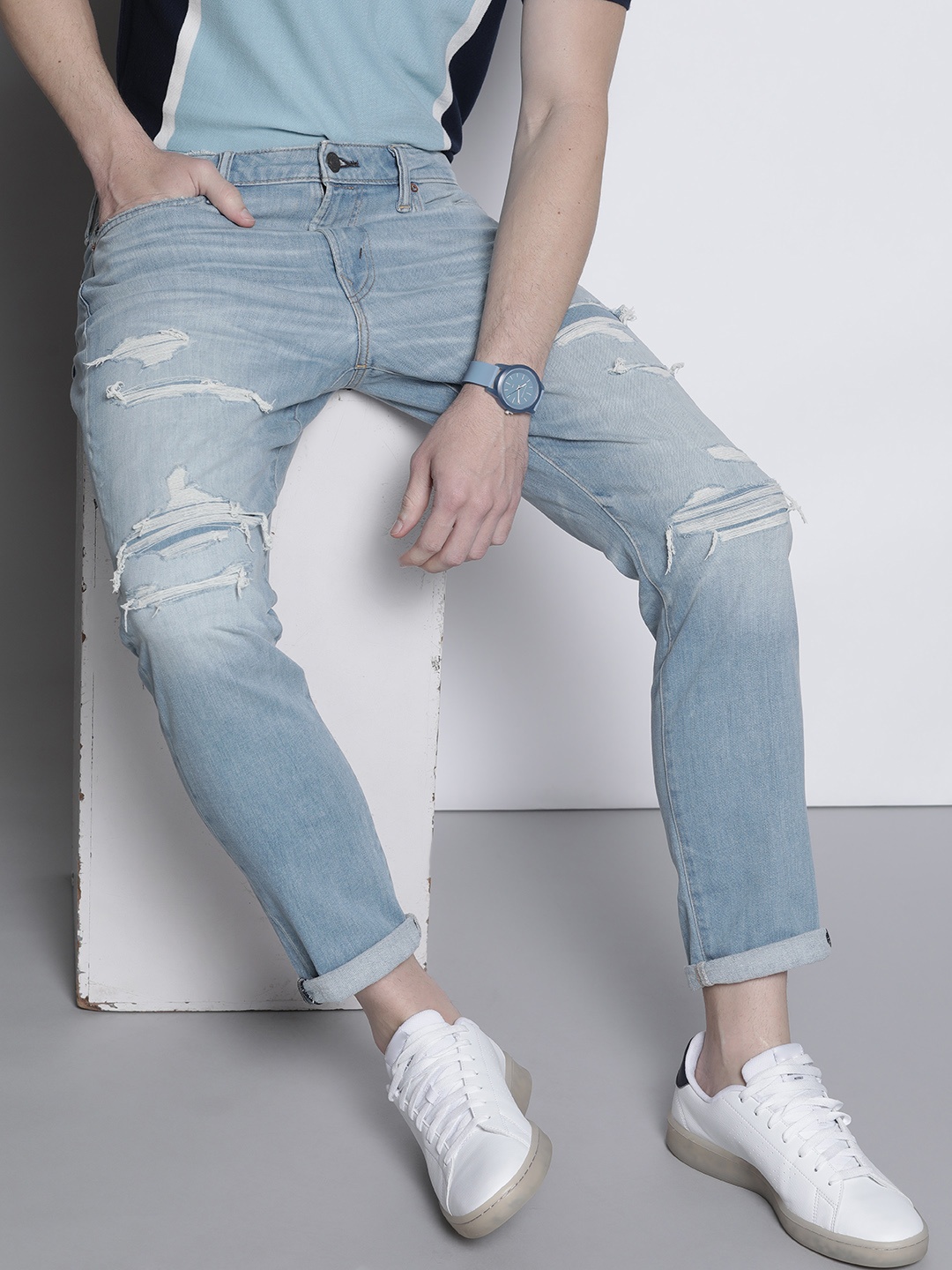 

AMERICAN EAGLE OUTFITTERS Men Blue Slim Fit Highly Distressed Light Fade Stretchable Jeans
