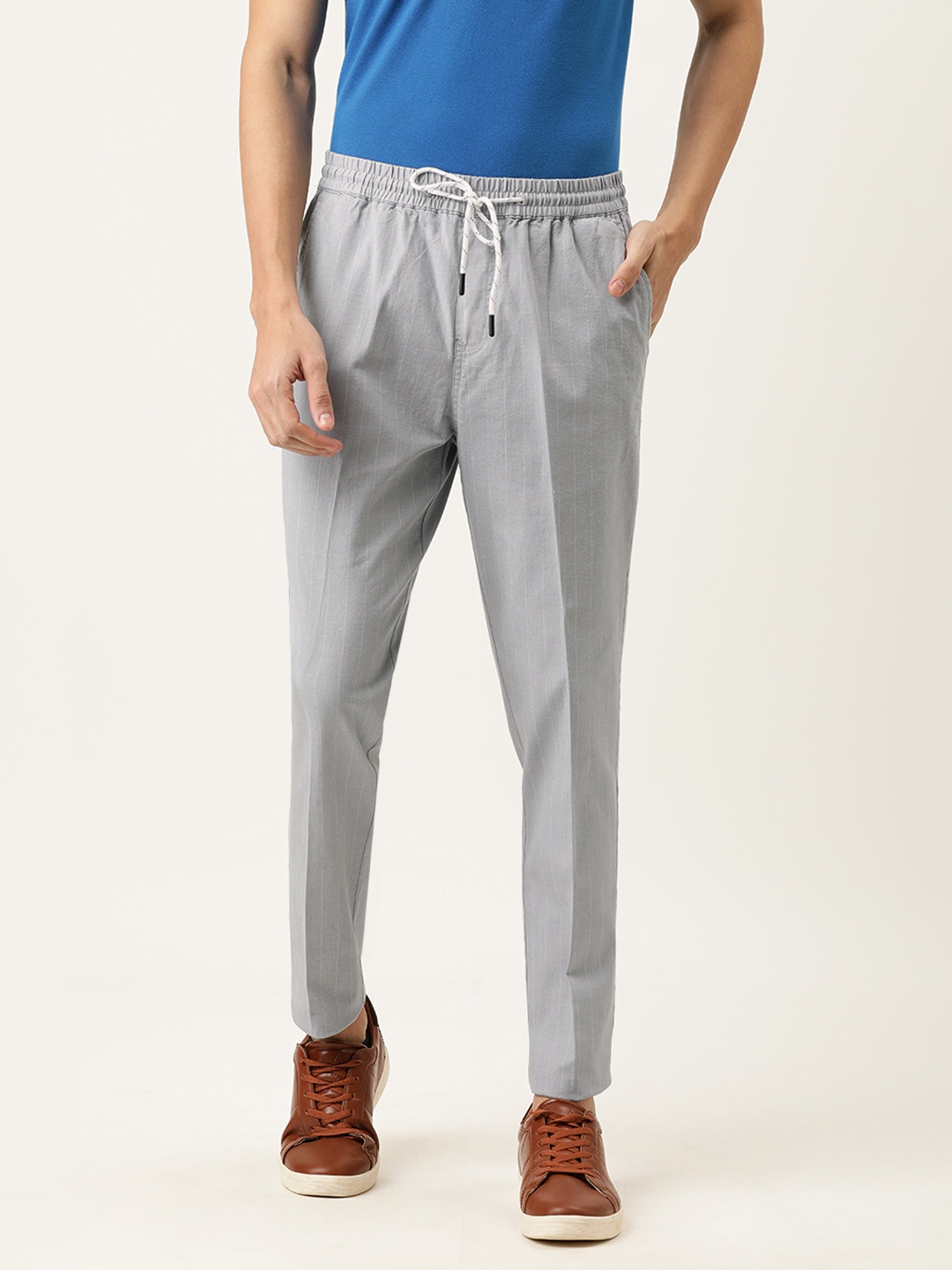 

Peter England Casuals Men Grey Solid Skinny Fit Trousers