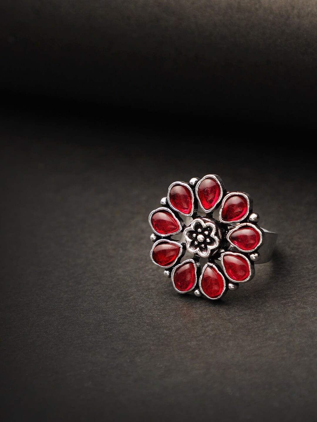 

Adwitiya Collection Oxidised Silver-Plated & Red Stone-Studded Adjustable Finger Ring