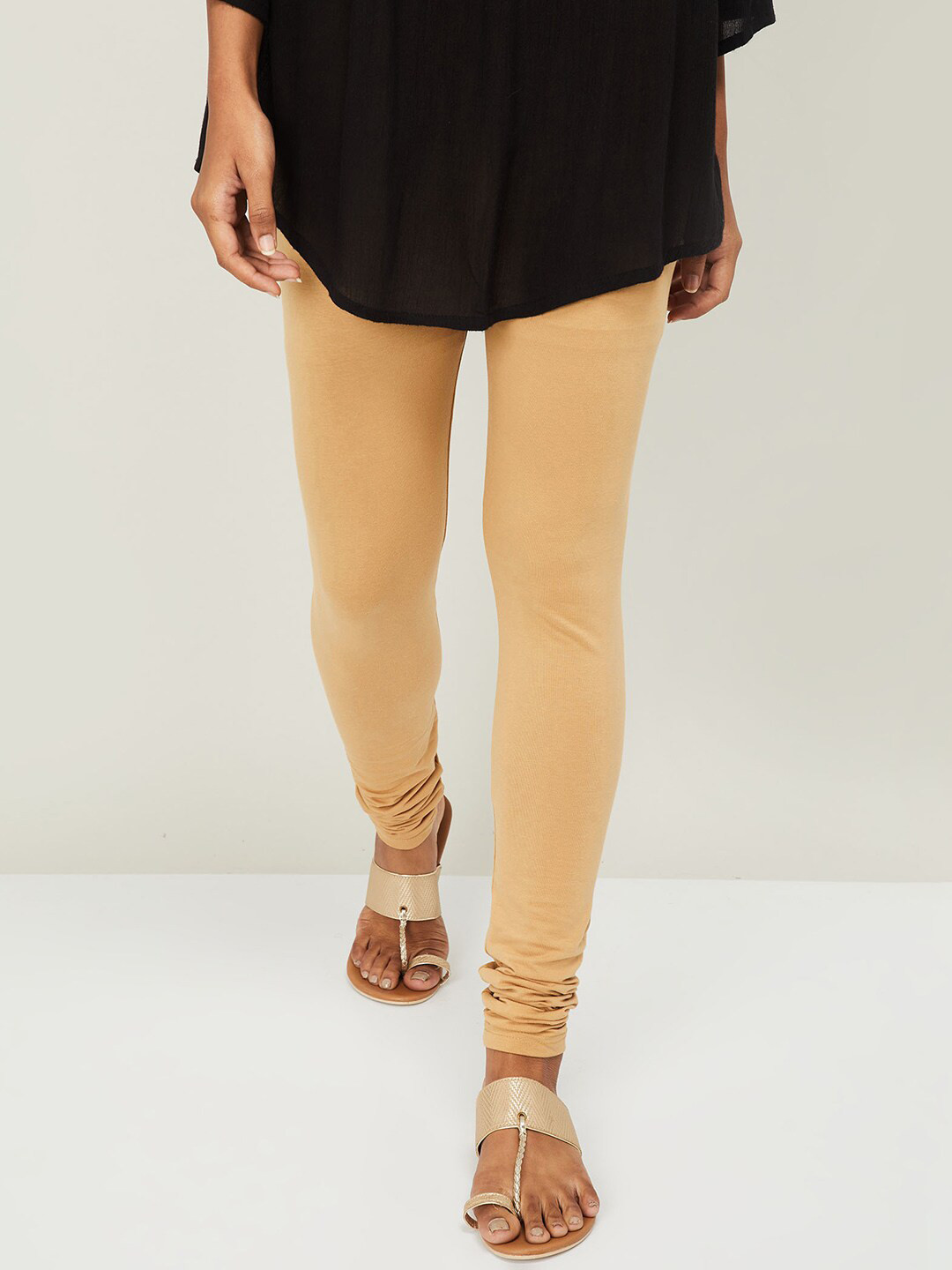 

Melange by Lifestyle Women Beige Solid Churidar-Length Leggings